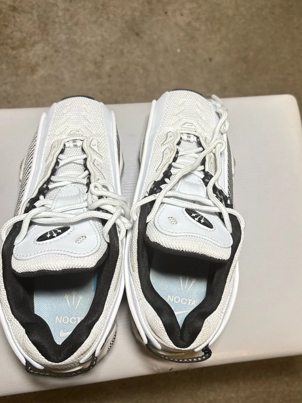 Nike nocta Black and White Textured Low-Top Sneakers